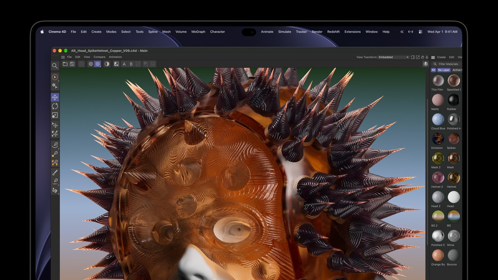 配備 PROLED XDR 顯示器的 MacBook Pro 螢幕上執行 Cinema 4D,顯示銅色 3D 頭盔模型